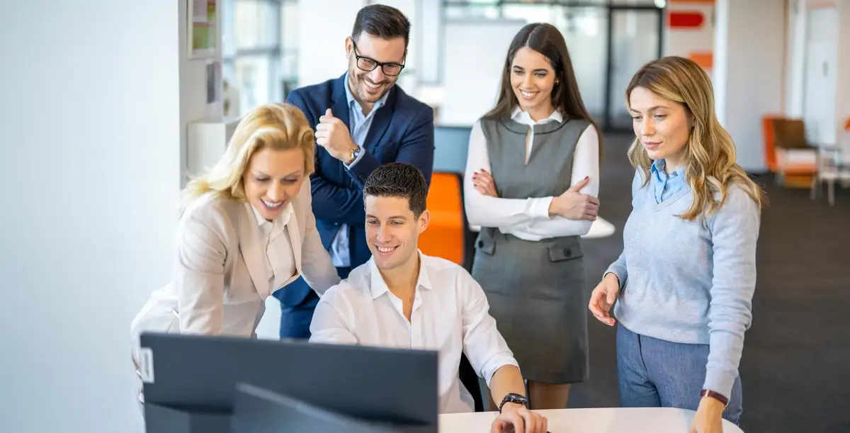 Business team celebrating SEO success and growth results